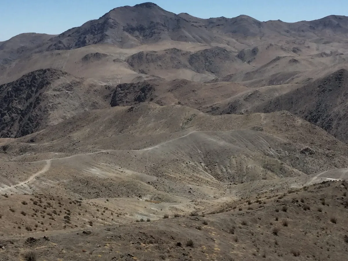 Andean ridgelines near a partner exploration project.