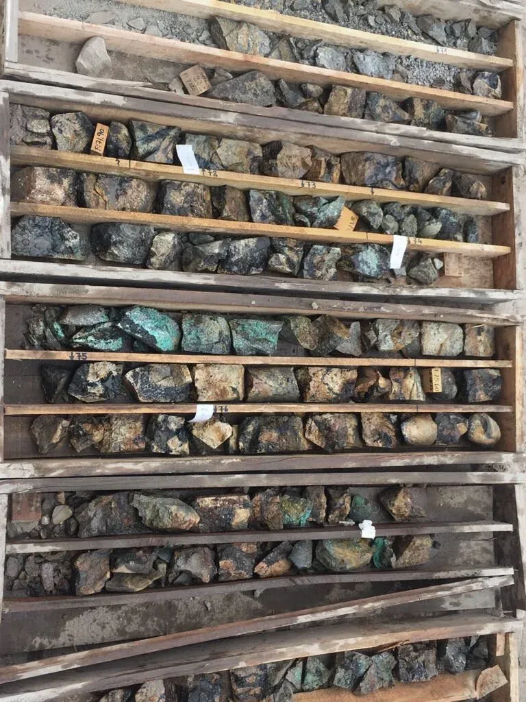 Boxes of drill core at a partner project — the physical record of what's in the ground.